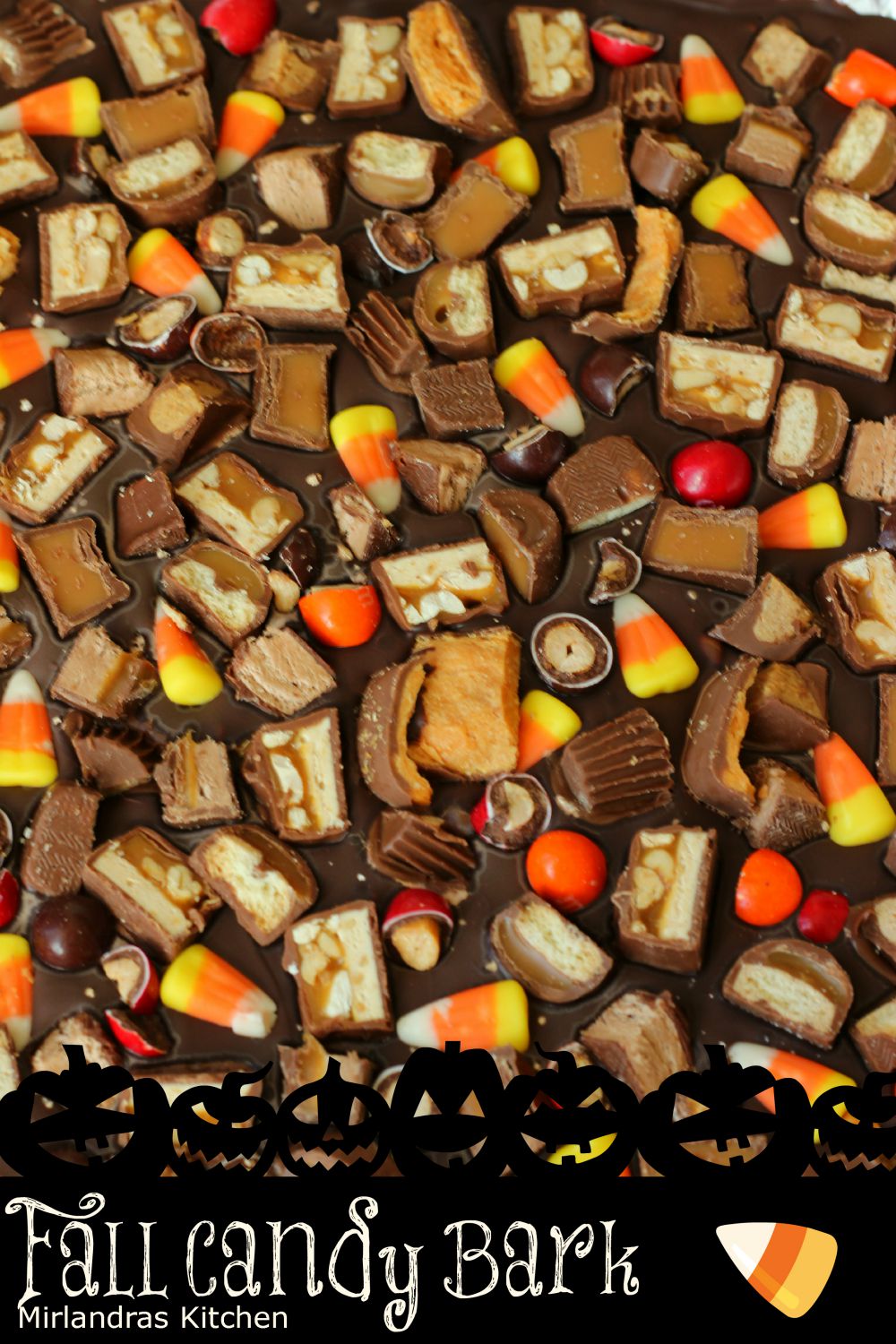 This Fall Candy Bark is the a truly over the top sugar rush perfect for Halloween time when we all have a little too much sugar. Rich milk chocolate is customized with your favorite candy bars and candy corn. No candy lover can resist! It is also easy to make and a good kid project. 